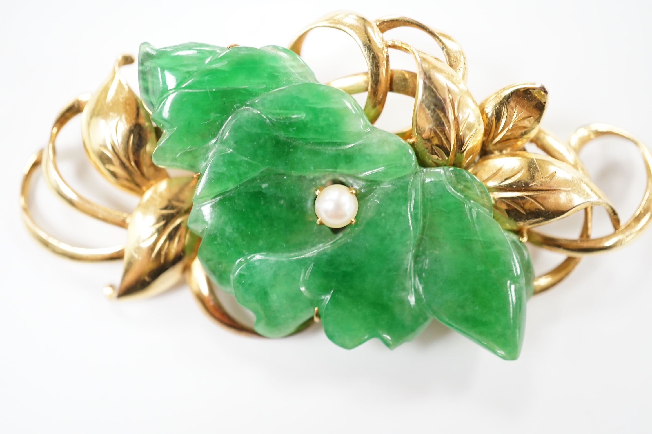 A 14k yellow metal, carved jade and seed pearl mounted floral spray brooch, 57mm